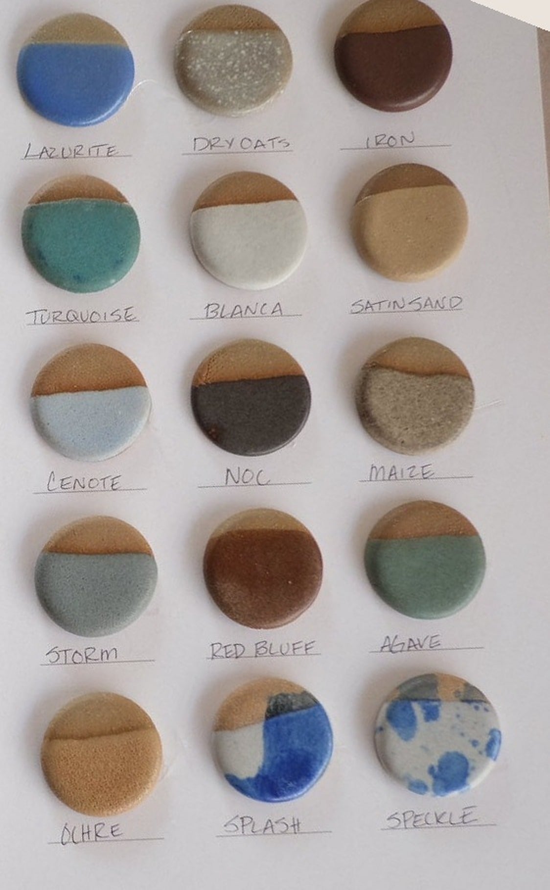 The sixteen Settle Ceramics glazes, shown as fired ceramic samples.